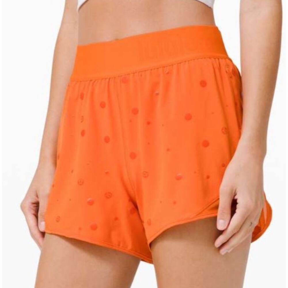 Lululemon Hotty Hot Short Size 4 Logo Poco Logo Foil Amber Orange